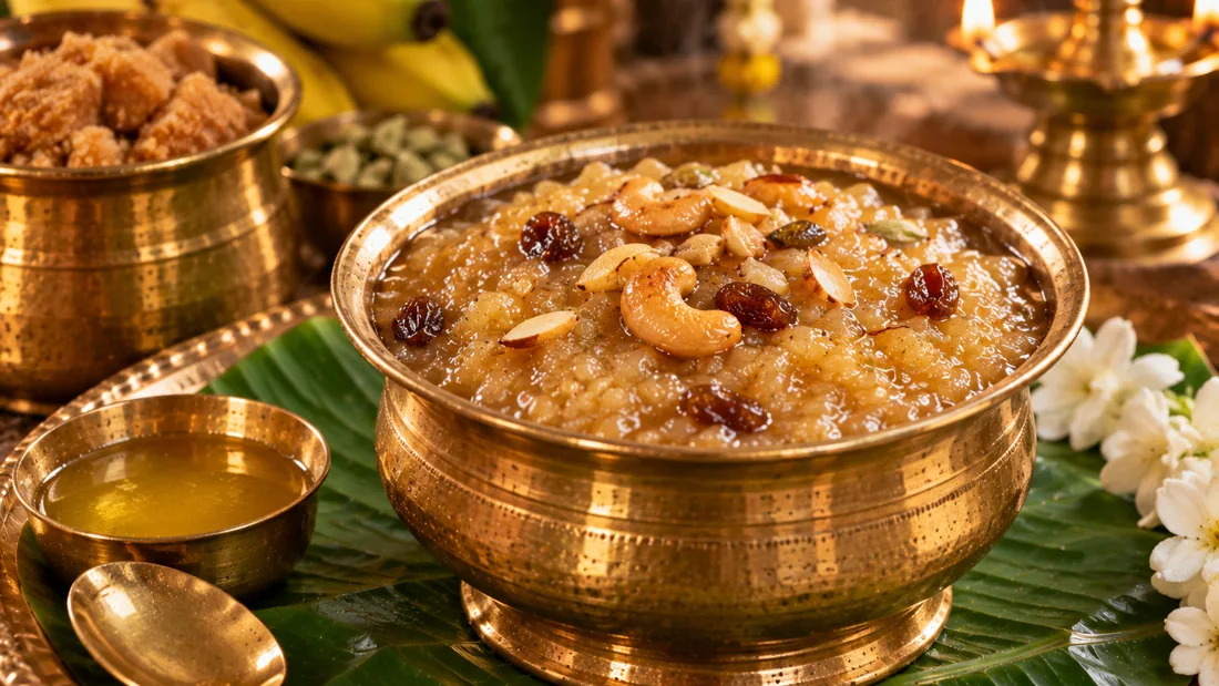 Sweet pongal garnished with cashews and raisins in a brass bowl